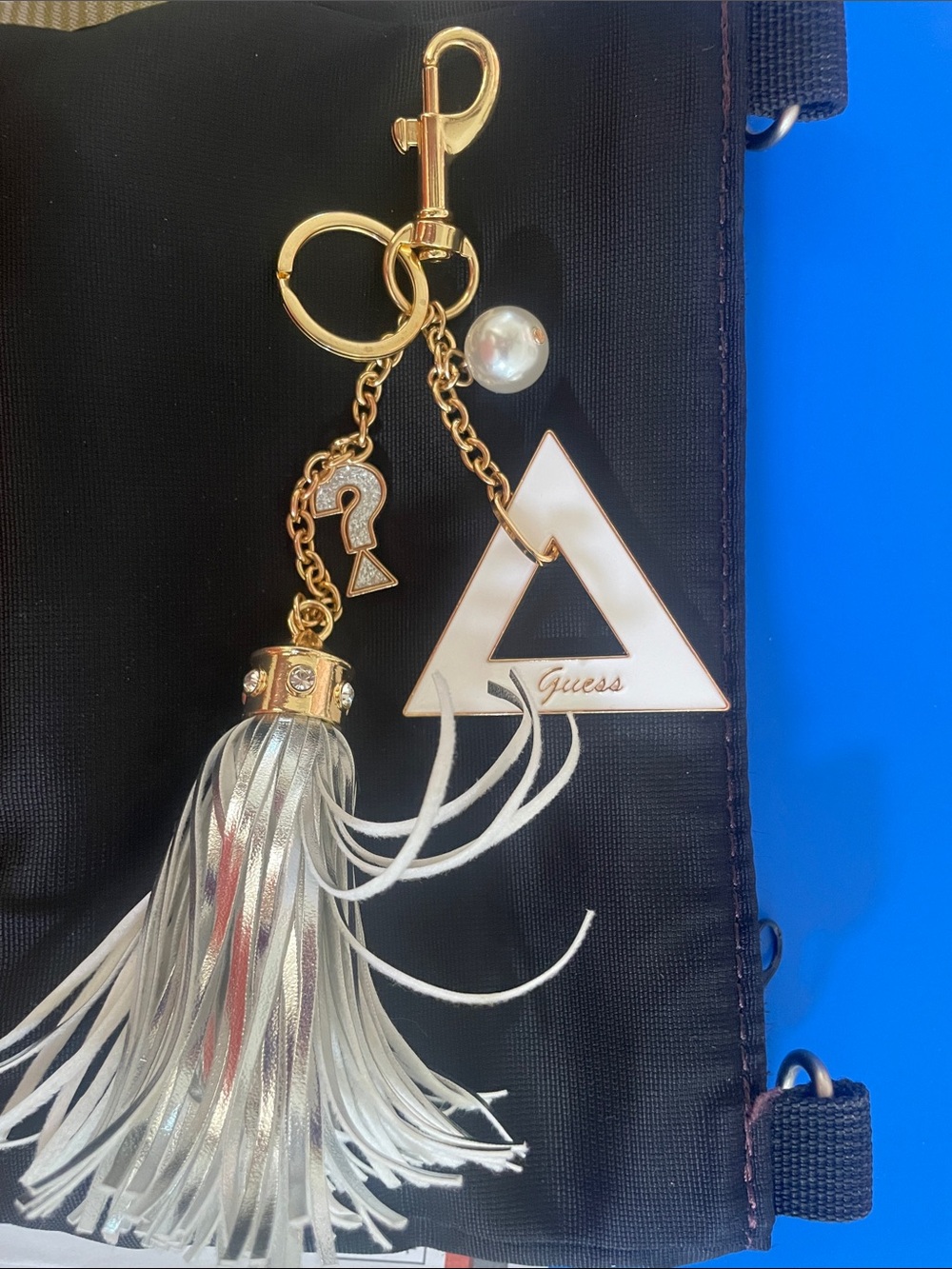GUESS White and Gold Logo Tassel Keyring Charm
